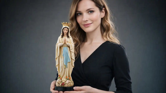 woman holds an antique our lady of lourdes statue