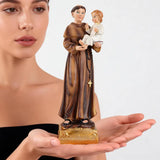 3-saint anthony statue with child jesus on model's hands