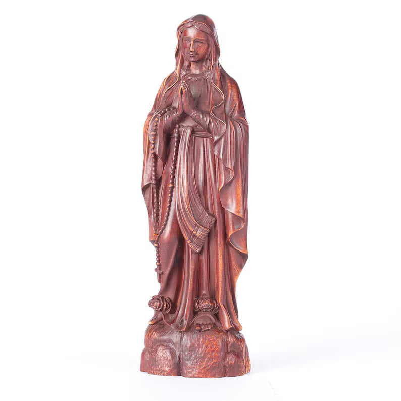hand-carved boxwood our lady of loudres statue white background