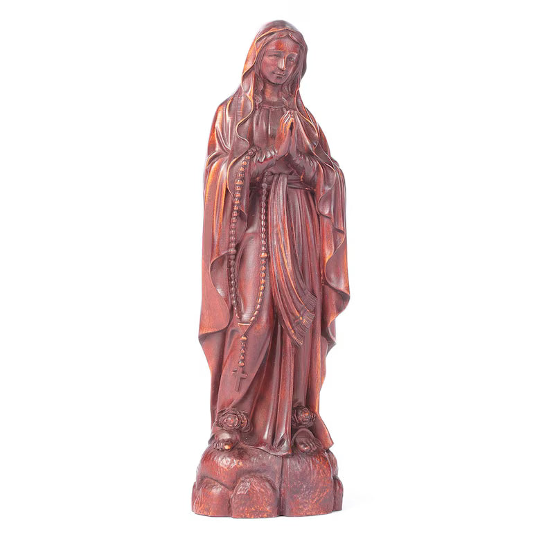 hand-carved boxwood our lady of loudres statue white background